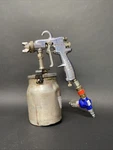 Binks 2100 Pressure Feed Conventional Spray Gun 66SD Nozzle With Canister L8 Used. Price: $160.00.