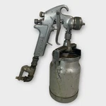 Devilbiss JGHV-530 Spray Paint Gun MBC-36BW/ Canister Used. Price: $79.99.