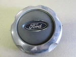 2002 Explorer Center Cap (wheel) Has Paint Peel 206995 Used. Price: $35.00.